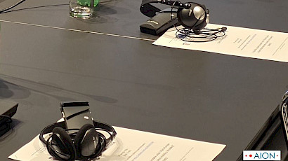 interpretation headsets and receivers on a conference table at a Zagreb conference